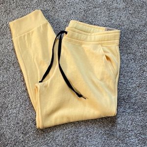 NWT PINK yellow women’s skinny joggers.